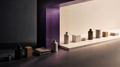 AI Visibility Optimizer for Shopify: product bottles and boxes on a softly lit display shelf
